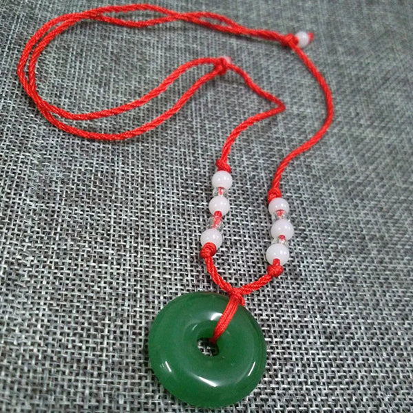 Graceful Jade Disc Pendant